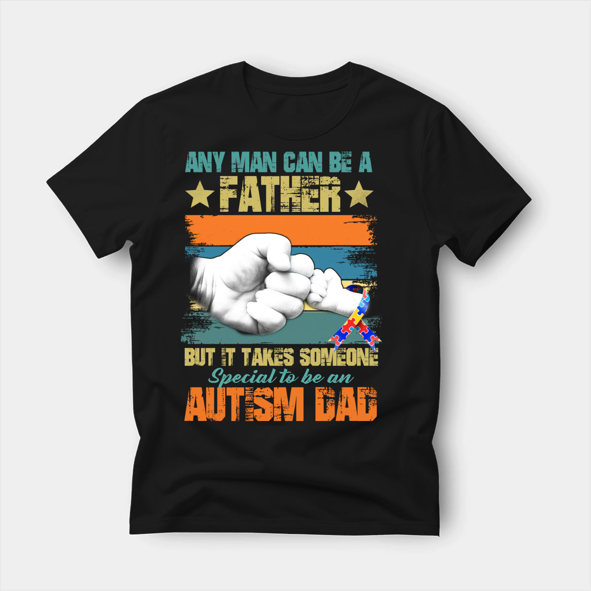 Black t-shirt printed with a distressed stars-and-stripes autism dad design in teal, khaki and orange, with an autism awareness puzzle ribbon and a father and child fist bump