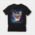 Black t-shirt printed with a Chihuahua with the words Faith, Hope, Love, Believe and Dream in glowing script on a sparkling blue background